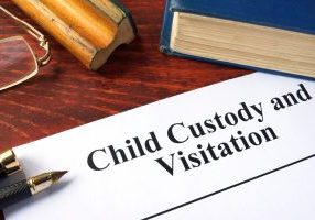 Child,Custody,And,Visitation,Written,On,A,Paper,And,A