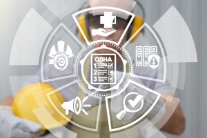 Occupational Safety and Health Administration. OSHA checklist documents. Industry employee working on virtual touchscreen selects osha document icon.